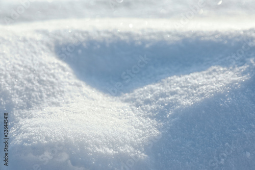 Beautiful snowdrift as background, closeup view. Winter weather © New Africa