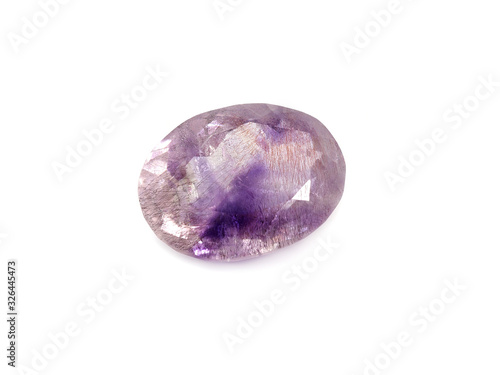 Purple faceted fluorite on a white background