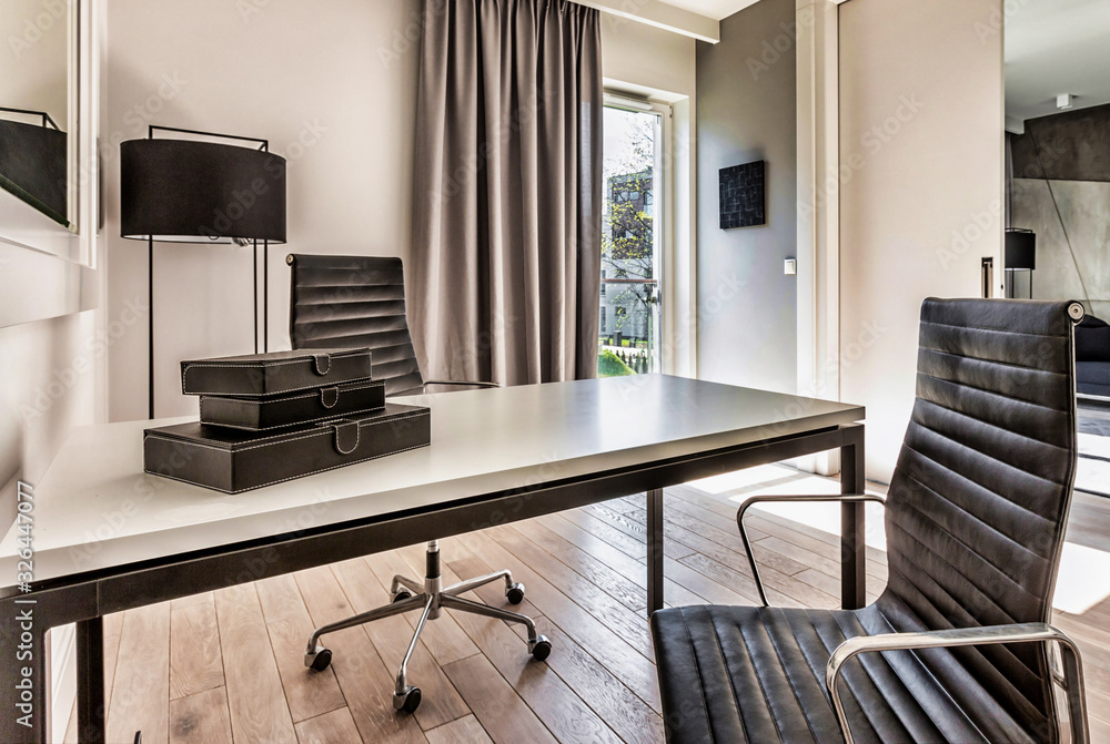 © MDBPIXS - Photo of modern office room in rental business apartment