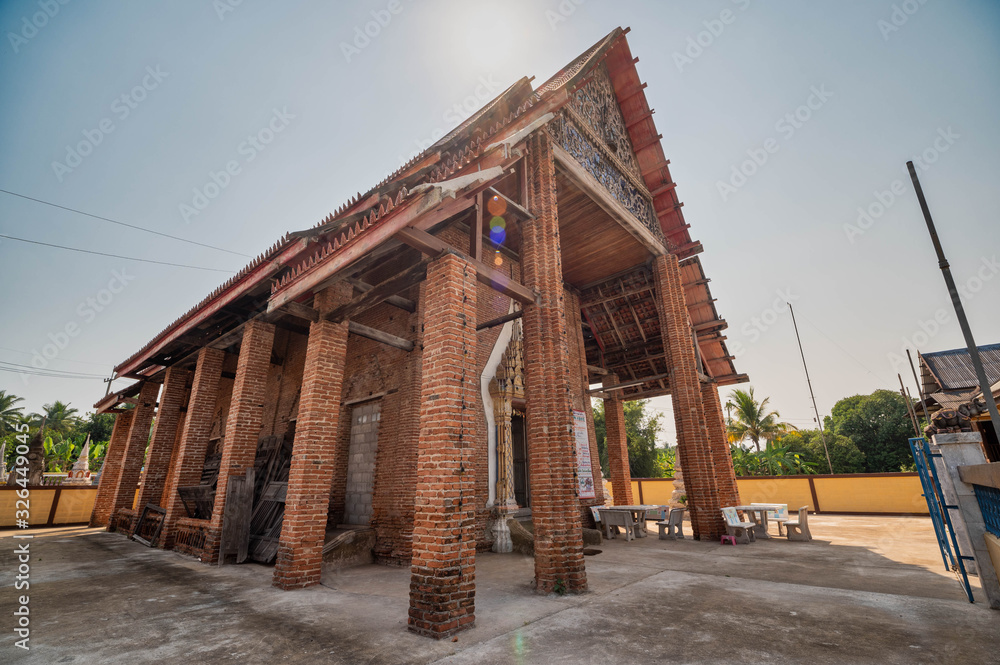 Amphawa District, Samut Songkhram / Thailand / February 23, 2020 : Wat Mueang Mai. The temple is located on the waterfront. With a peaceful atmosphere. The old church remains to be seen.. Amphawa District, Samut Songkhram / Thailand / February 23, 2020 : Wat Mueang Mai. The temple is located on the waterfront. With a peaceful atmosphere. The old church remains to be seen..