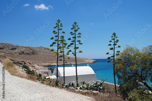 A small seafront chapel near Pondamos beach at Emborio on the Greek island of Halki. photo