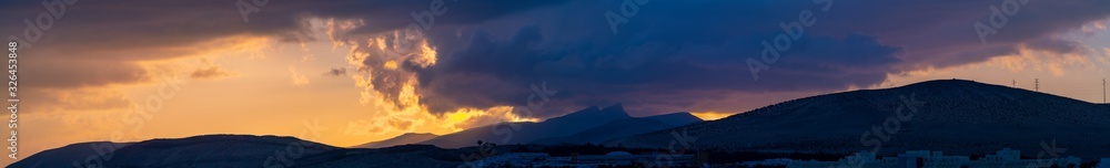  Panorama of Golden Sunset Over The Mountains Silhouette Of A Mountain Range Against The Sky At Sunset