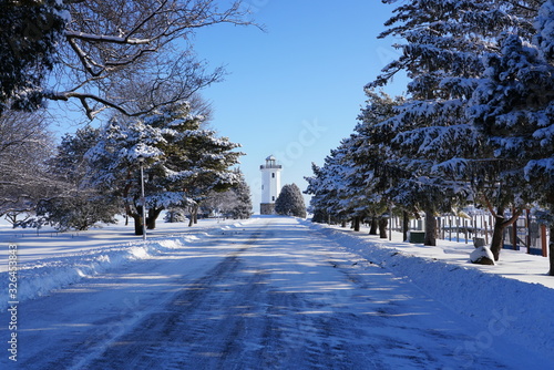Fond du Lac, Wisconsin's lighthouse standing out in the Winter season of February at Lakeside Park Winter Wonderland