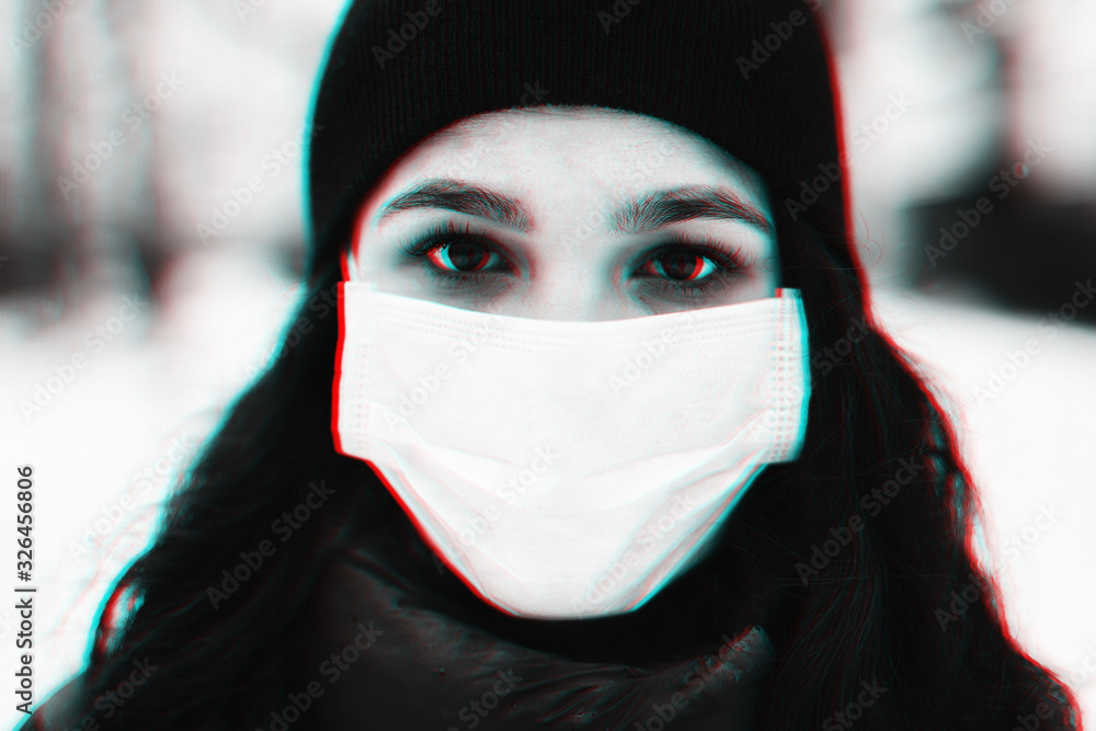 portrait of a girl in a medical mask to protect against the virus and flu epidemic portrait of a girl in a medical mask to protect against the virus and flu epidemic