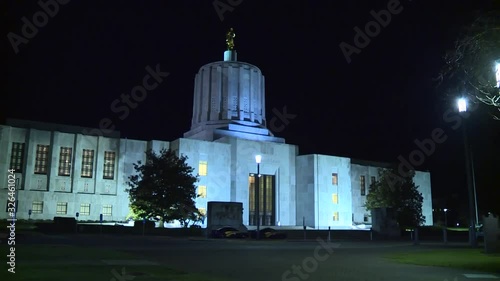 OUTSIDE THE OREGON STATE CAPITOL BUILDING AT NIGHT IN SALEM OREGON photo