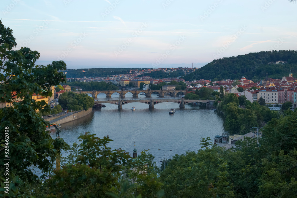 Evening view of the bridge Prague in spring