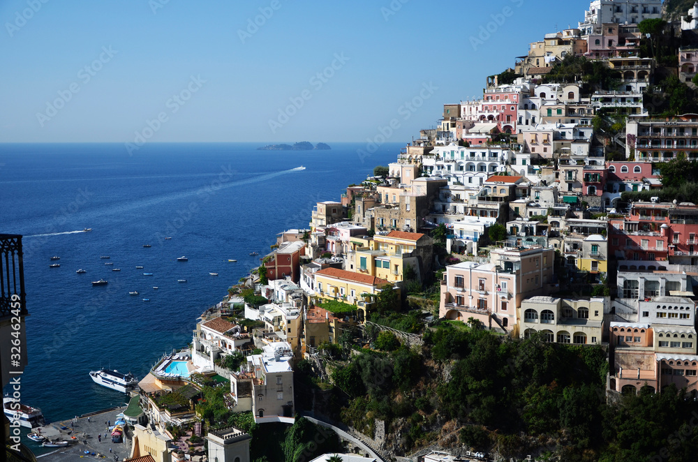 The village of Positano overlooks the sea, climbing steeply to the rocky walls of Monte Sant'Angelo a Tre Pizzi, among vegetable gardens, steps and steps.. Amalfi coast, Italy