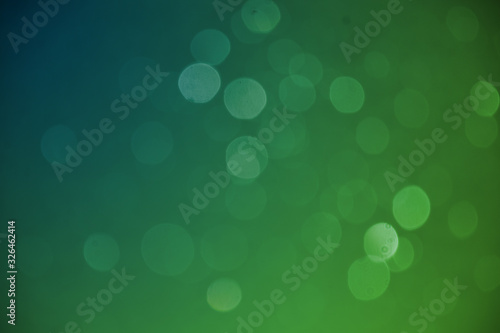Abstact bokeh lights with soft light background.
