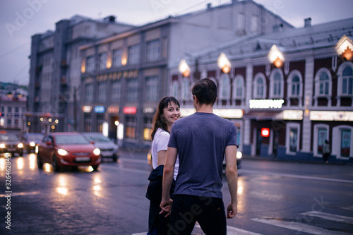 Hugging loving boy and girl outside