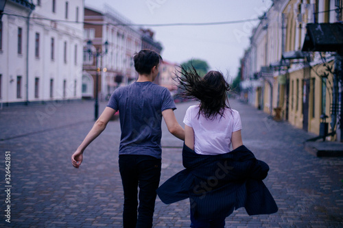 Hugging loving boy and girl outside