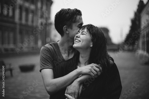 Hugging loving boy and girl outside