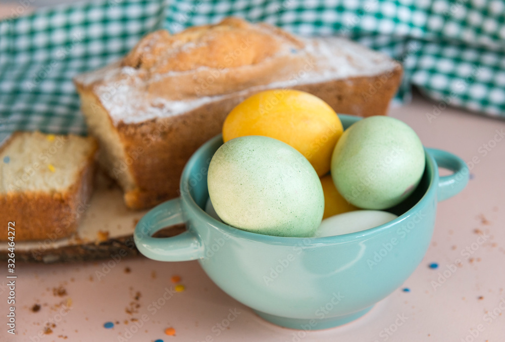green and yellow Easter eggs in a plate, cake, green and yellow Easter eggs in a plate, cake,
