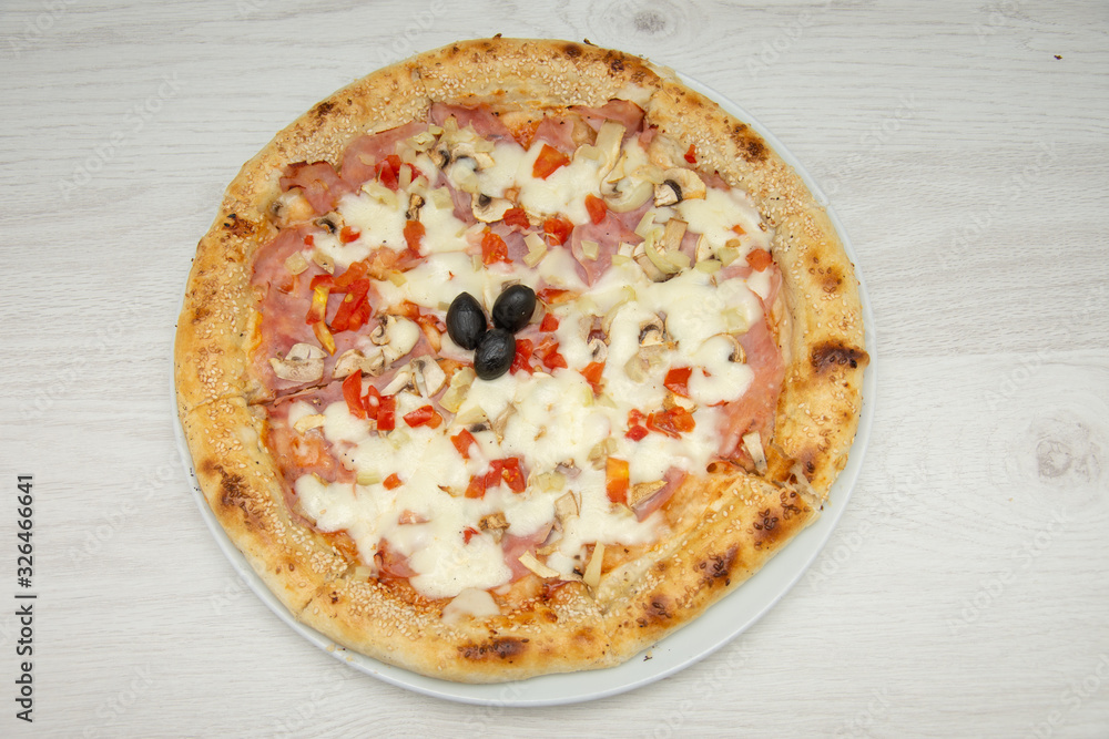 pizza with peppers and mushrooms, sesame and olives pizza with peppers and mushrooms, sesame and olives