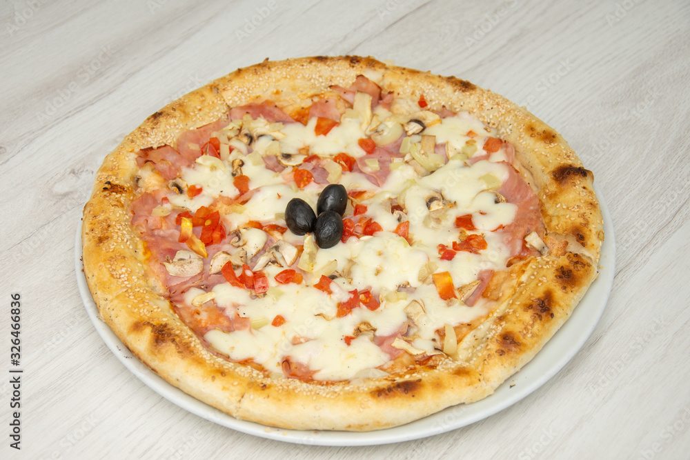 pizza with peppers and mushrooms, sesame and olives pizza with peppers and mushrooms, sesame and olives