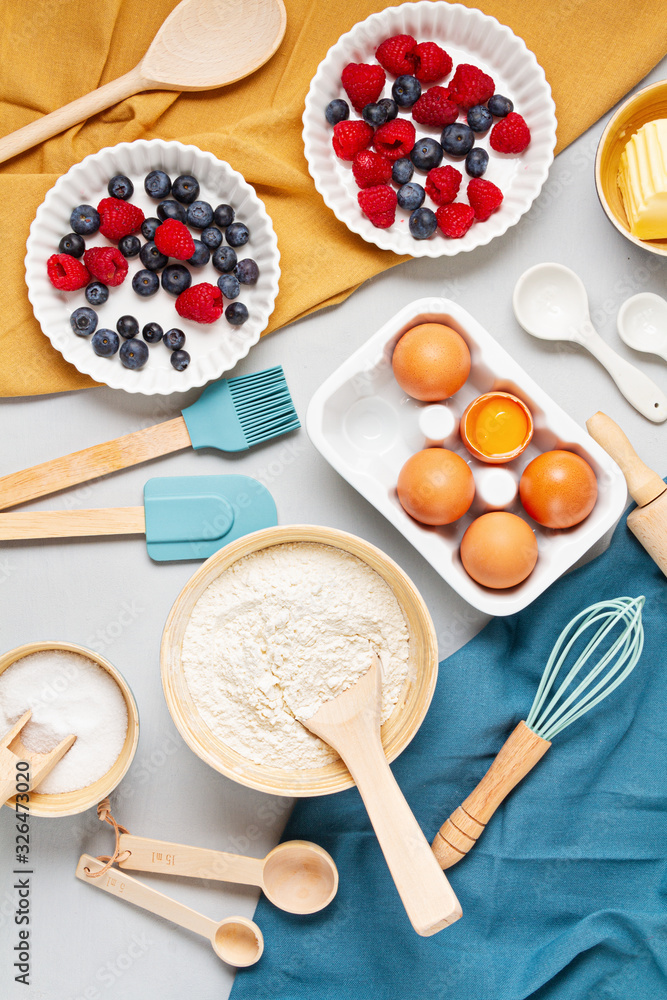 Rustic baking ingredients flat lay. Homemade pastry, baking. Top view flat lay background. Copy space. Healthy fresh organic food. Rustic baking ingredients flat lay. Homemade pastry, baking. Top view flat lay background. Copy space. Healthy fresh organic food.
