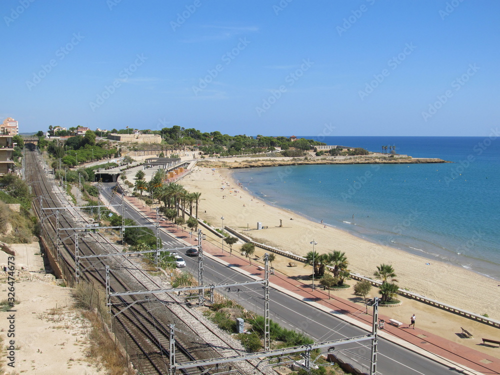 Aerial view of Tarragona, Spain. View of the empty beach and railway