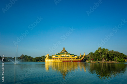 Burmese royal barge Golden Karaweik palace on Kandawgyi Lake in Bogyoke Park in Yangon, Myanmar