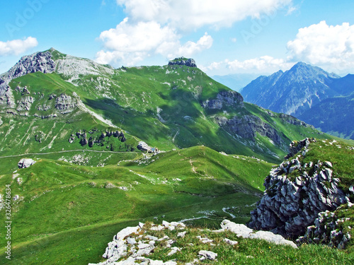 Alpine mountain peaks Augstenberg and Gorfion over the Saminatal alpine valley and in the Liechtenstein-Austrian Alps mountain range - Steg, Liechtenstein photo