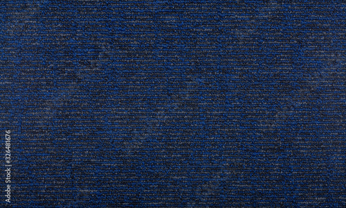 Carpet covering background. Pattern and texture of blue colour carpet. Copy space