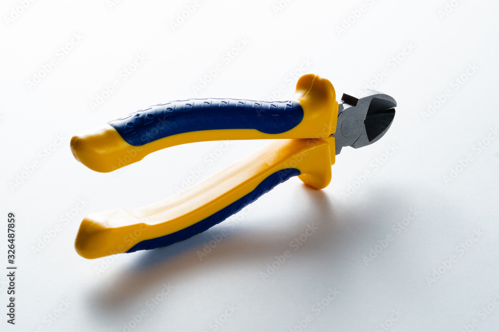 wire cutter, metal tool, yellow and blue handle
