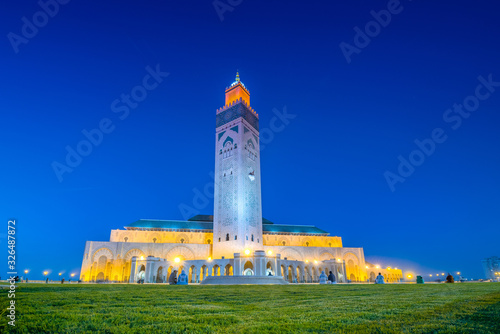 The Hassan II Mosque is a mosque in Casablanca, Morocco. It is the largest mosque in Morocco with the tallest minaret in the world. photo