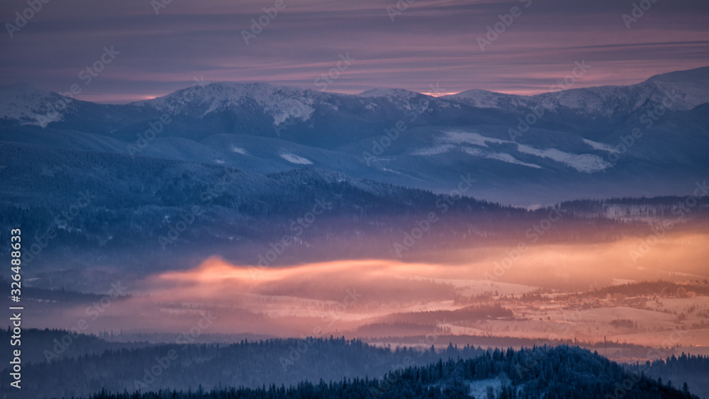 Inversion in the mountains. Gorgany seen from the Tarnica Mt in Poland. Carpathian Mountains.