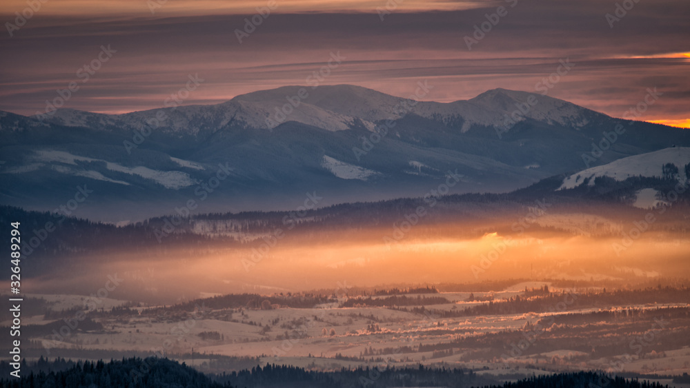 Inversion in the mountains. Gorgany seen from the Tarnica Mt in Poland. Carpathian Mountains.