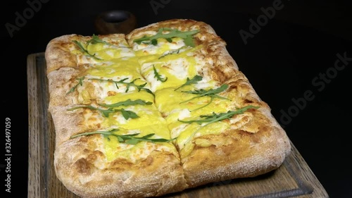 Roman square pizza with cheese and lettuce photo