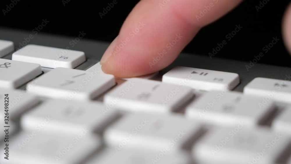 Pressing the Backward button multiple times on keyboard. Close-up Pressing the Backward button multiple times on keyboard. Close-up