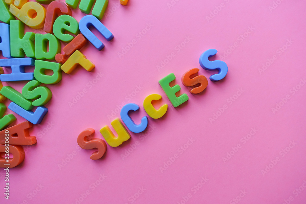 Obraz premium Success concept, with colorful letters.