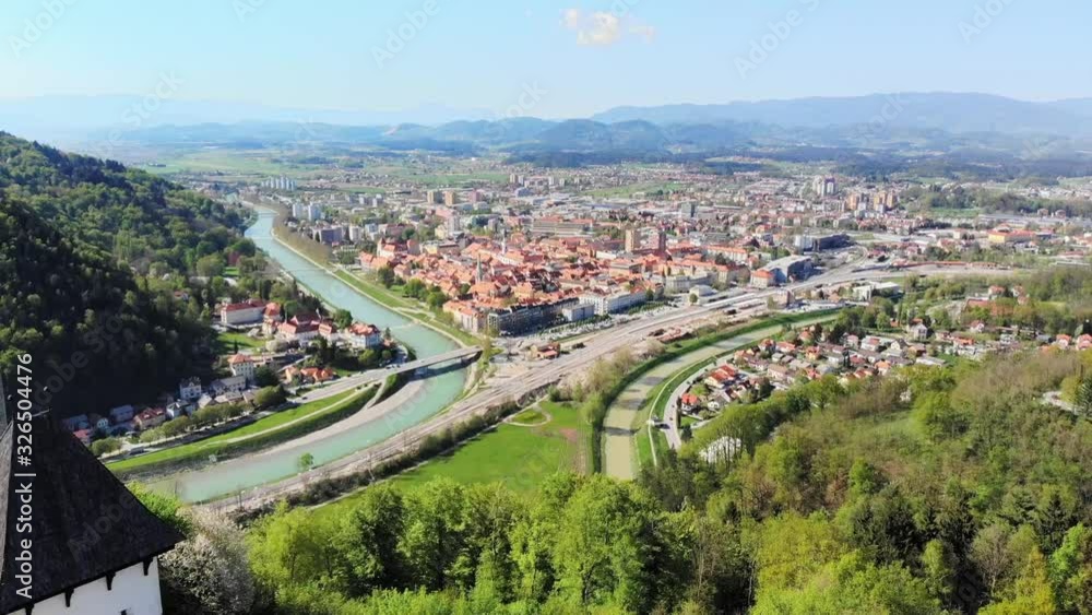 Birds eye view showing the ancient architecture of Celje castle with present modern cityscape around. Aerial. Birds eye view showing the ancient architecture of Celje castle with present modern cityscape around. Aerial.