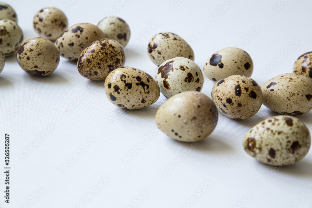 quail eggs on a white background. Easter and easter decoration quail eggs on a white background. Easter and easter decoration