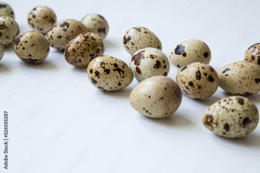 quail eggs on a white background. Easter and easter decoration