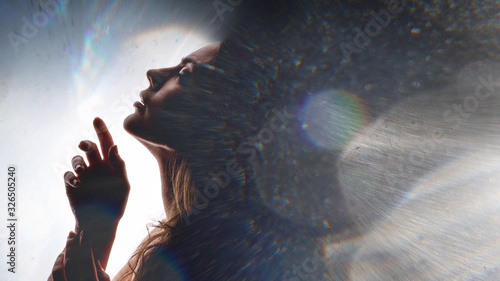 Double exposure of women face and galaxy. Abstract woman portrait on the background  of space world. Mystery astrology