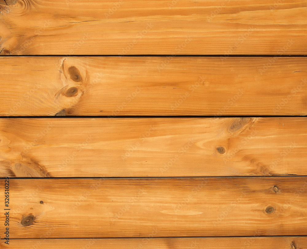 Fototapeta premium Wooden abstract background.Texture of wooden boards with aged rings.