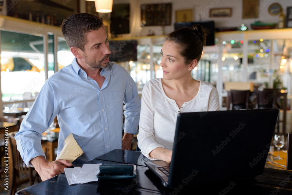 business people in discussion in a bar business people in discussion in a bar