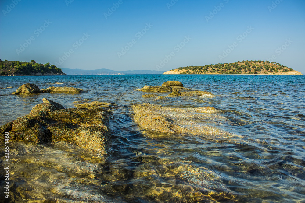 island rocky picturesque coast line landscape scenic view nature photography in summer clear weather day time