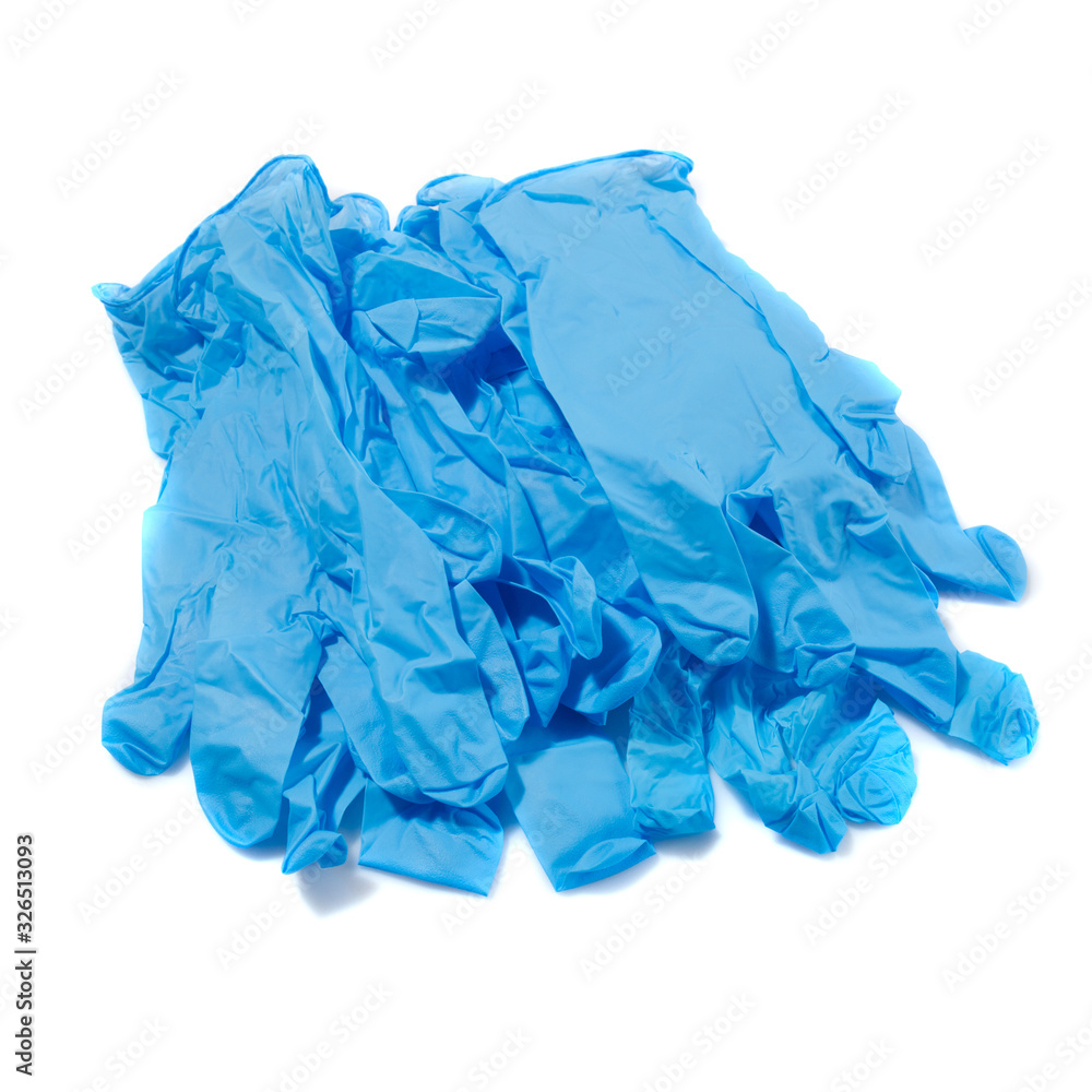 pile of blue medical gloves on white a background