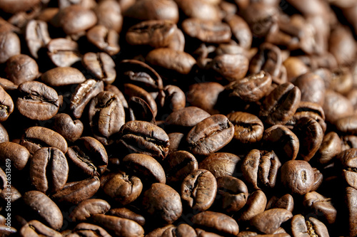 Coffee beans texture, seed on dark background