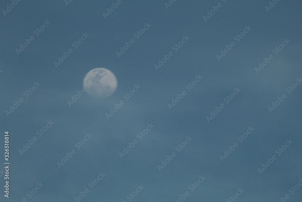 the moon in a late afternoon the moon in a late afternoon