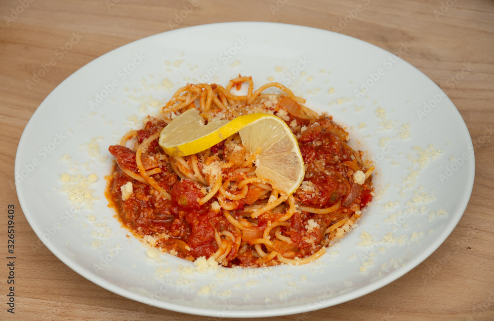 platter with Spaghetti Tono ,Spaghetti Tonno - pasta, tuna, tomatoes, garlic, platter with Spaghetti Tono ,Spaghetti Tonno - pasta, tuna, tomatoes, garlic,