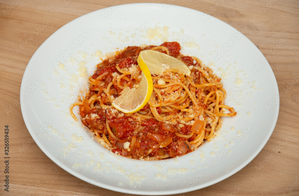platter with Spaghetti Tono ,Spaghetti Tonno - pasta, tuna, tomatoes, garlic, platter with Spaghetti Tono ,Spaghetti Tonno - pasta, tuna, tomatoes, garlic,