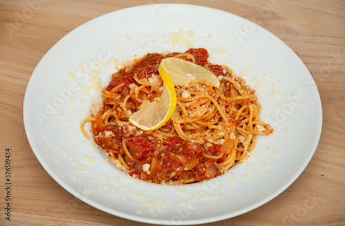 platter with Spaghetti Tono ,Spaghetti Tonno - pasta, tuna, tomatoes, garlic,