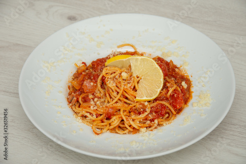 platter with Spaghetti Tono ,Spaghetti Tonno - pasta, tuna, tomatoes, garlic,