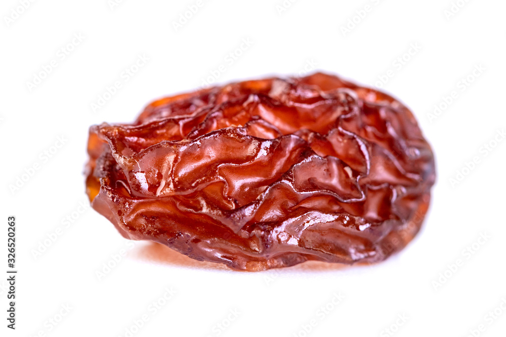 Raw raisin, dried grape isolated on white background