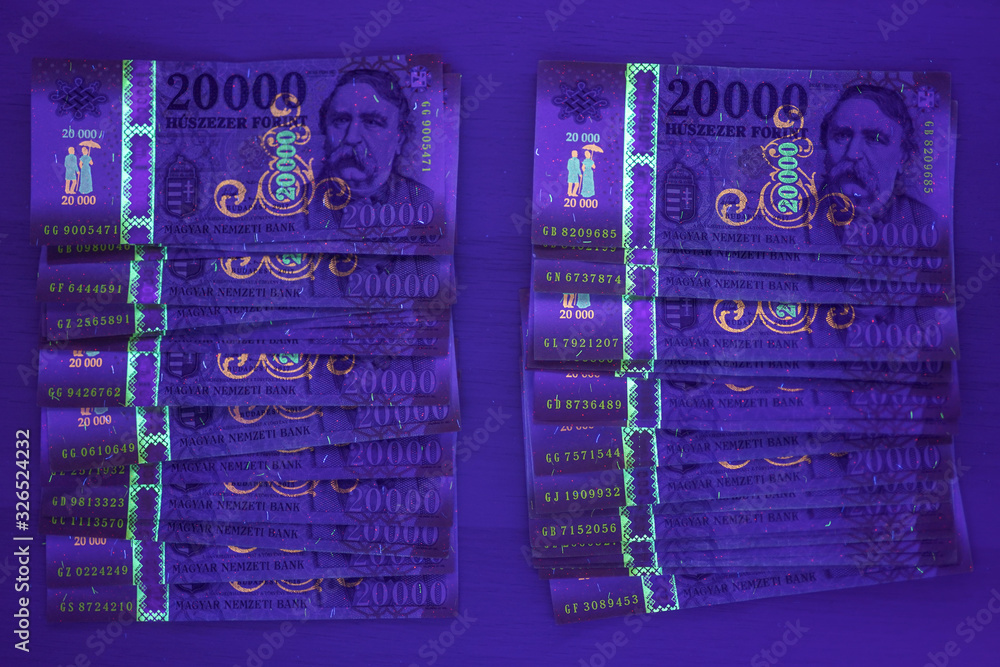 Check The Authenticity Of Money 20000 Hungarian Forint Banknote In UV check-the-authenticity-of-money-20000-hungarian-forint-banknote-in-uv