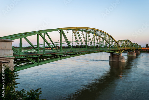 Bridge Connecting two Countries, Slovakia and Hungary before Sunset © kaycco