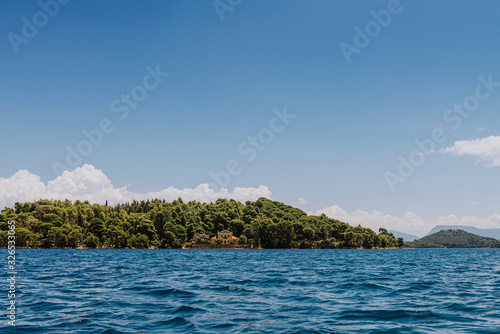 Small uninhabited tropical island in the ocean. © andreiko