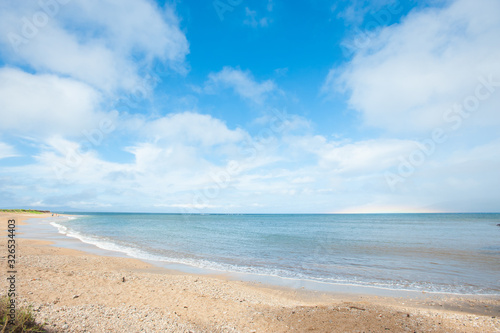 Uakoko, Low-lying rainbow over the sea © MiekoPhoto