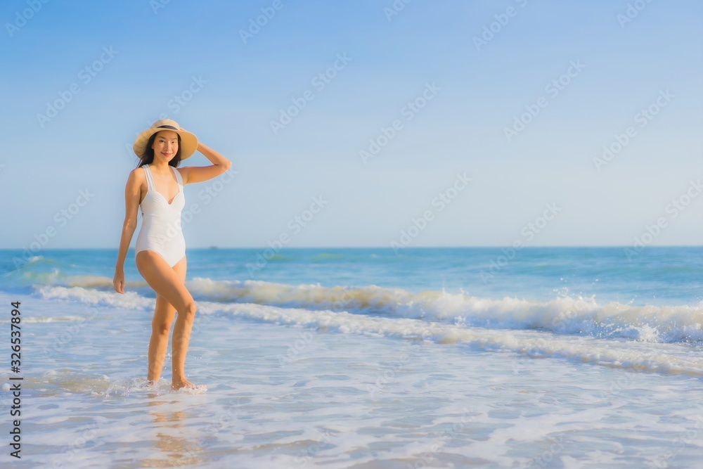 Portrait beautiful young asian woman happy smile around sea ocean beach Portrait beautiful young asian woman happy smile around sea ocean beach